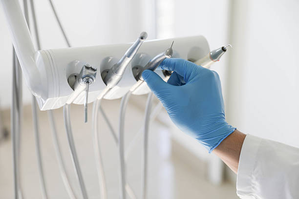 Professional Dental Veneers technician working in Three Oaks, FL